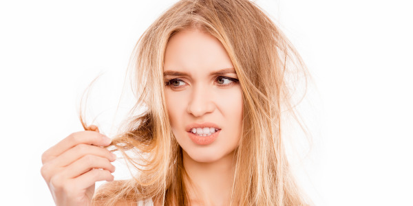 Od czego wypadają włosy? Najczęstsze przyczyny